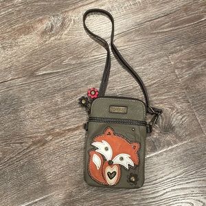 CHALA Leather crossbody bag with fox character patch.